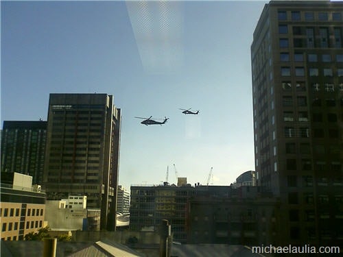 blackhawk hovering building in the city