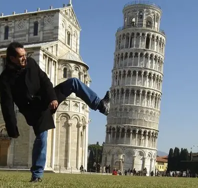 Man kicking the Pisa Tower
